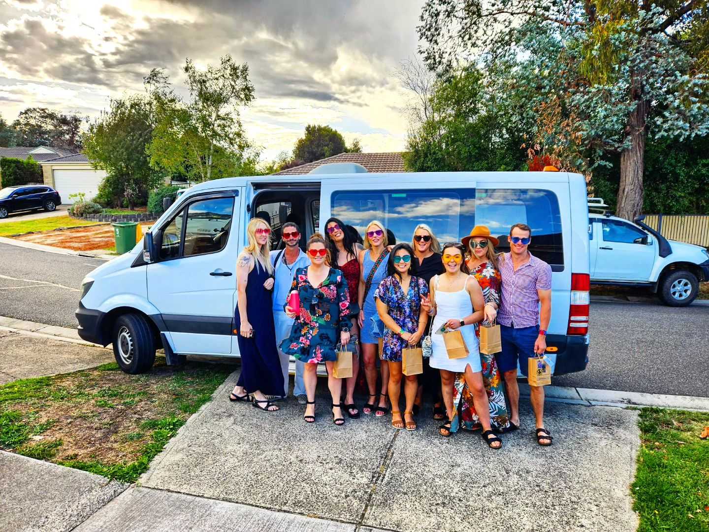 The Red Carpet Charters Mercedes-Benz Sprinter with a group